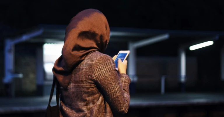 muslim girl hijabi holding phone